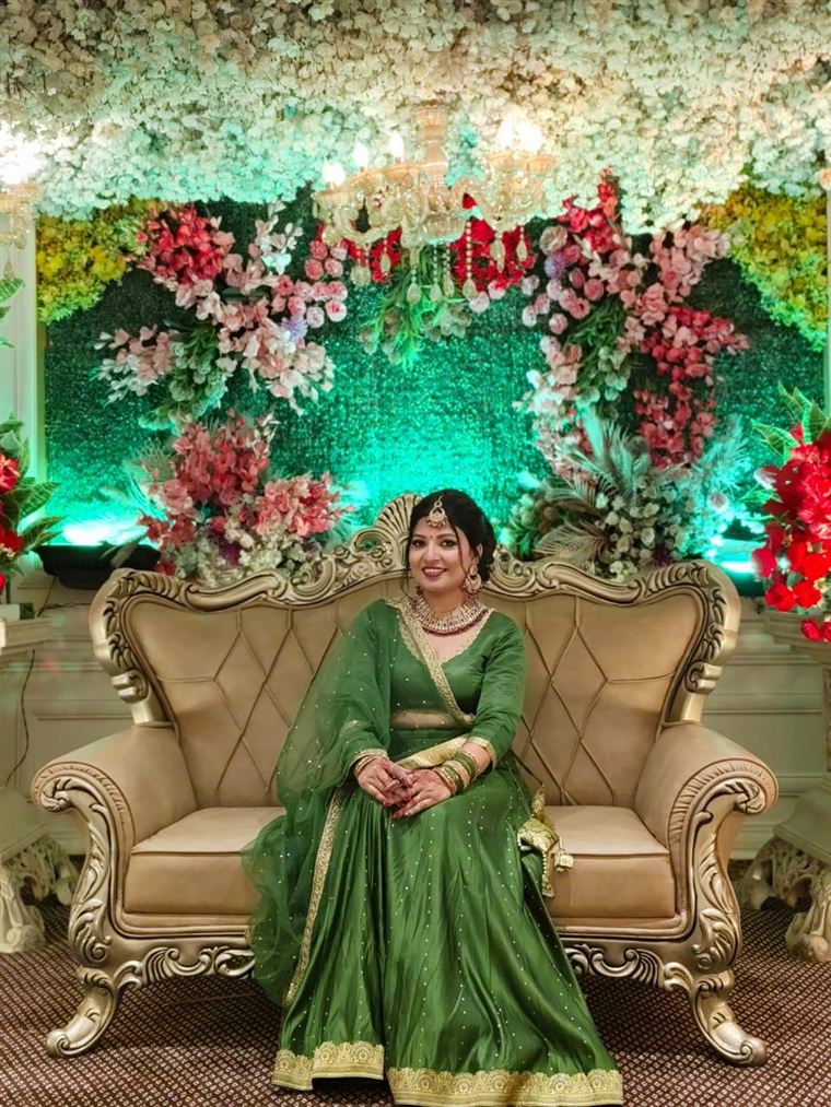 Green anarkali with net dupatta at a wedding