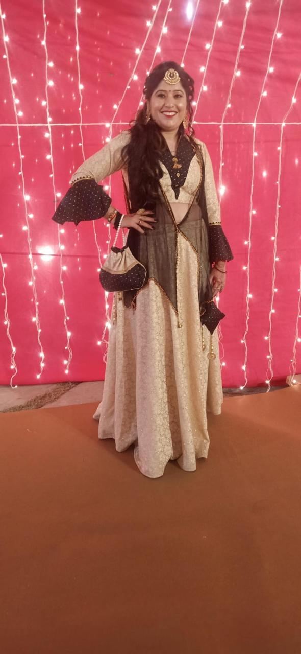 Ivory and black jacket lehenga